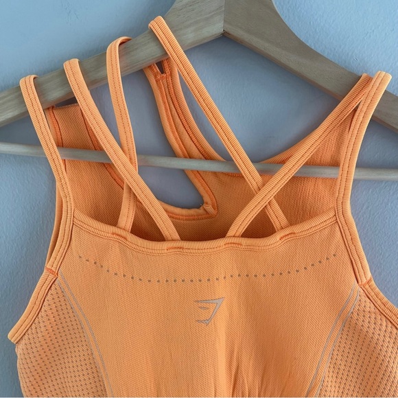 !SOLD! GYMSHARK Neon Orange Ultra Seamless Asymmetrical Workout Sports Bra - Picture 6 of 9